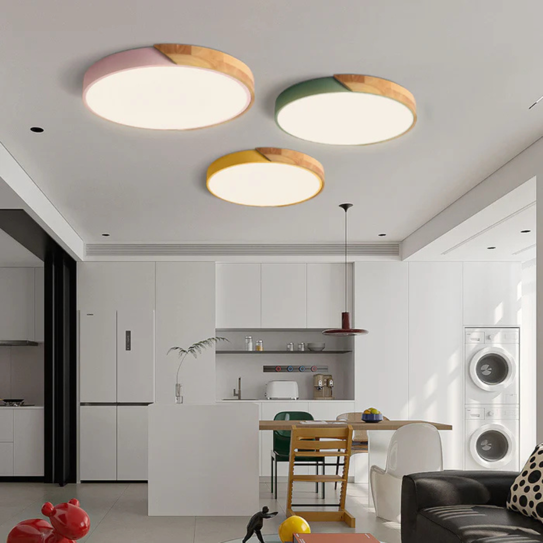 Plafonnier moderne coloré dans une cuisine contemporaine, éclairage LED, design minimaliste, intérieur lumineux, décoration tendance.