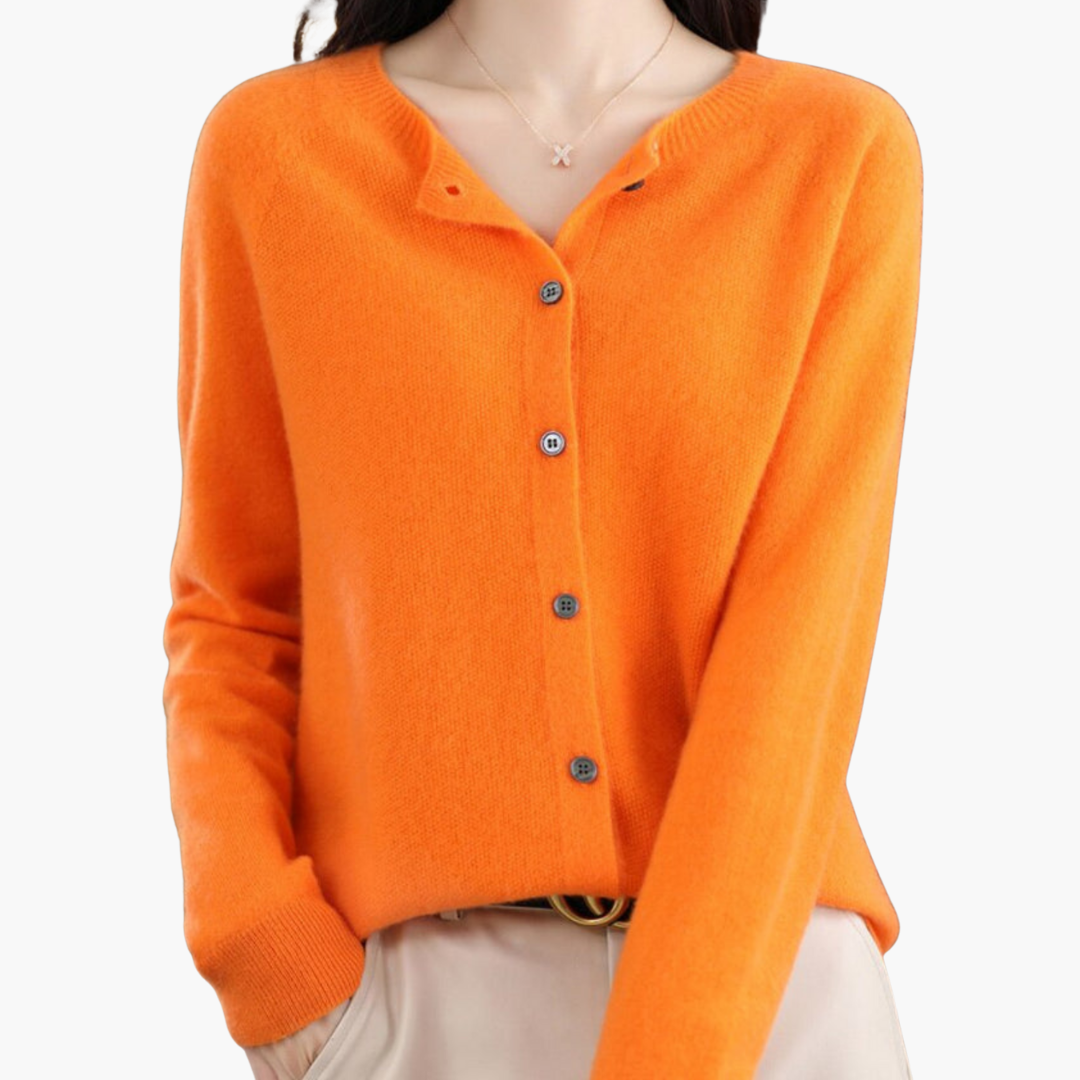Cardigan orange en cachemire pour femme, manches longues, col rond, boutons noirs, style élégant et confortable, mode automne-hiver.