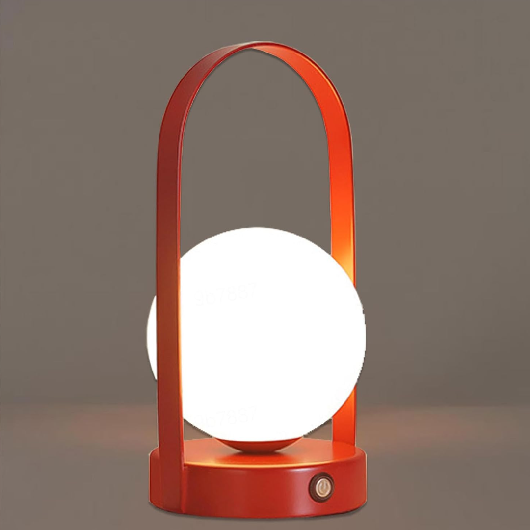 Lampe de table LED moderne rouge, design minimaliste avec poignée arquée et globe lumineux, éclairage d'intérieur élégant et contemporain.