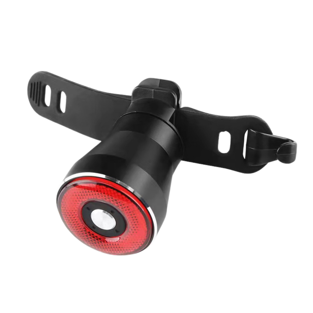 Feu arrière de vélo LED rouge, étanche, avec support noir ajustable. Accessoire de sécurité essentiel pour cyclisme nocturne.
