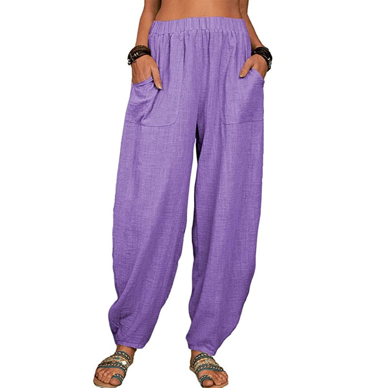 Pantalon ample violet pour femme, taille haute, poches avant, style décontracté, idéal pour l'été, confort et mode, sandales assorties.