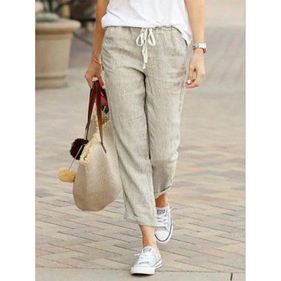 Pantalón casual de mujer en tejido transpirable con corte 7/8 y cintura elástica.