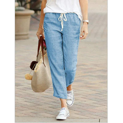 Pantalón casual de mujer en tejido transpirable con corte 7/8 y cintura elástica.