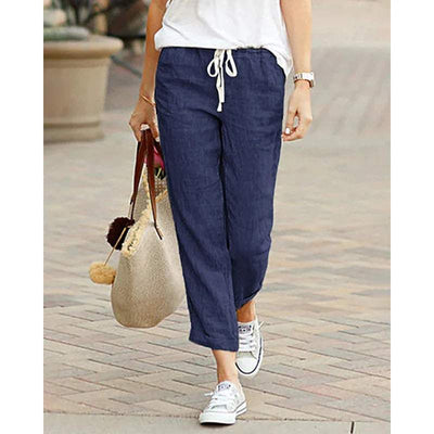Pantalón casual de mujer en tejido transpirable con corte 7/8 y cintura elástica.