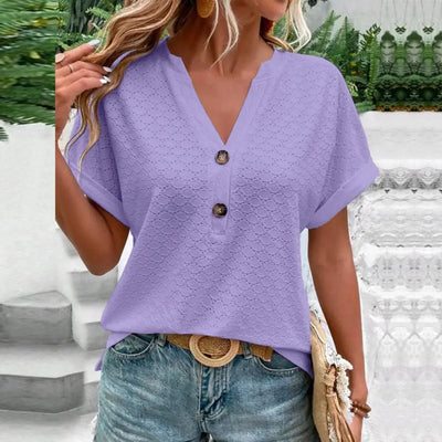 Top transpirable con cuello en V Myla: cómodo y elegante para todos los días.