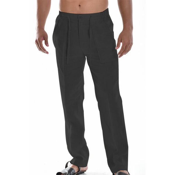 Pantalon noir homme élégant, coupe droite, porté avec sandales. Mode masculine, tenue décontractée, style moderne.