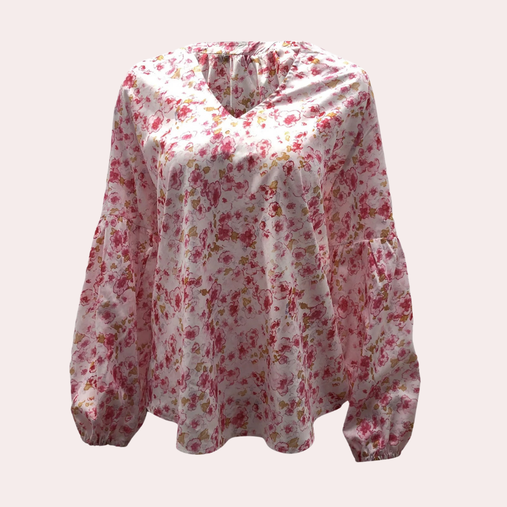 Blouse à manches longues en tissu floral rose et blanc, col en V, style décontracté. Mode féminine, tendance printemps, vêtement léger.