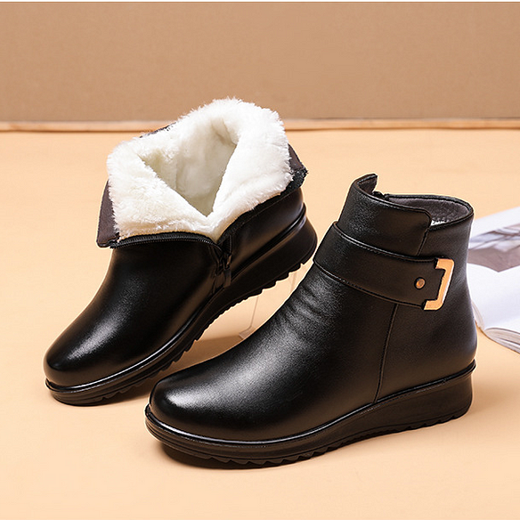 Bottes d'hiver noires pour femme avec doublure en fourrure blanche, fermeture éclair latérale, semelle antidérapante, idéales pour temps froid.