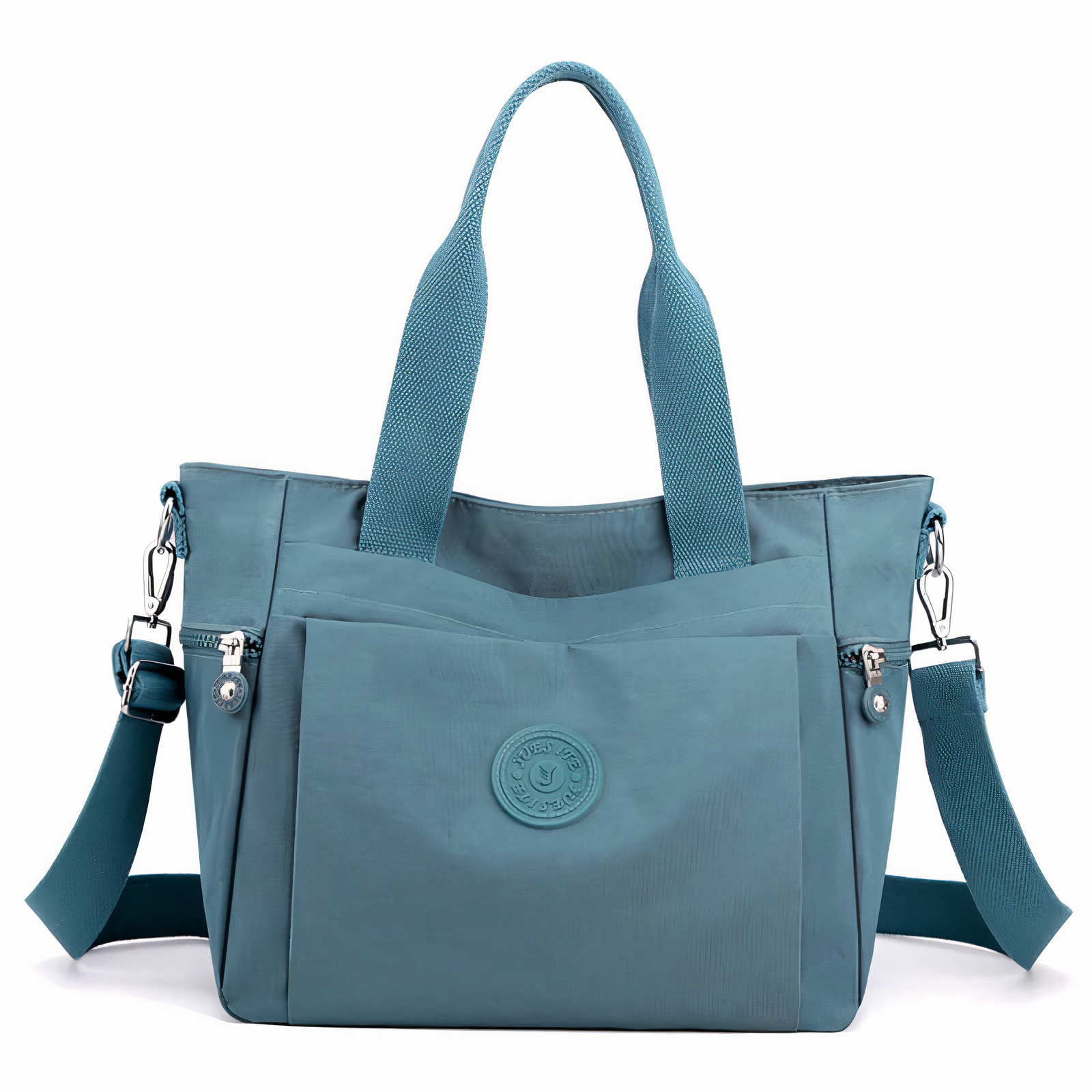 Sac à main bleu en nylon avec bandoulière amovible, poches extérieures zippées et logo central. Accessoire mode femme, pratique et élégant.