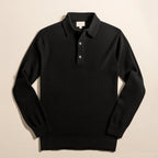 Pull en laine noir élégant avec col polo et boutons, idéal pour un look chic et intemporel. Mode masculine, vêtement automne-hiver.
