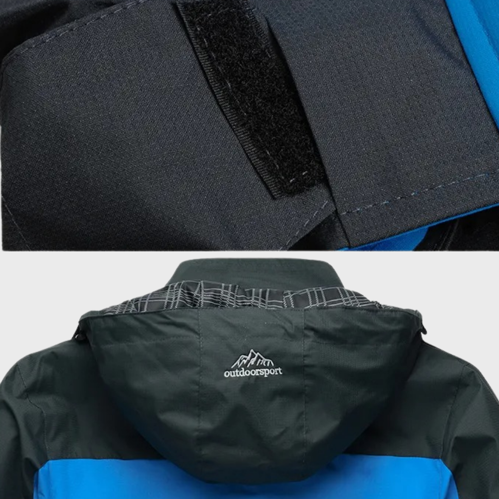 Veste imperméable noire et bleue avec capuche, fermeture velcro, logo "outdoorsport". Idéale pour randonnée, activités extérieures par temps humide.