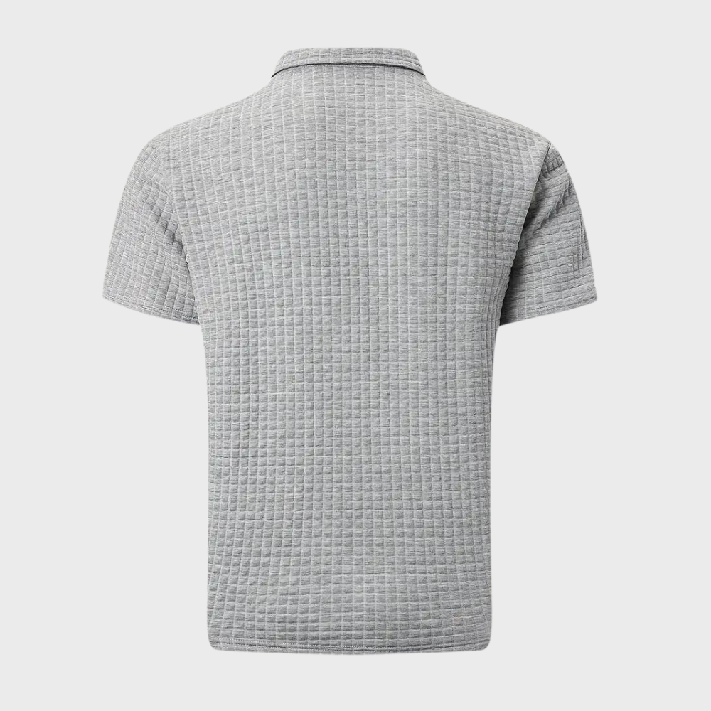Polo gris à manches courtes en tissu texturé, motif quadrillé, col classique, style décontracté, idéal pour homme, mode été.