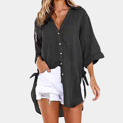 Blusa de mujer azul claro, tejido suave, corte cómodo, verano