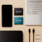 Smartphone, SSD portables noir et bleu, clavier d'ordinateur portable, câbles USB Type-C et Type-A sur fond beige. Accessoires technologiques modernes.