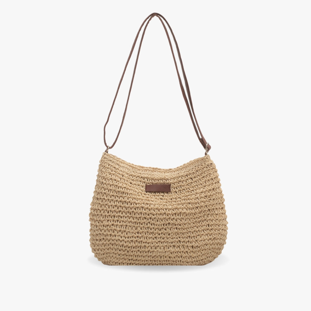 Sac à main en paille tressée beige avec bandoulière marron, style bohème chic, idéal pour l'été et les sorties décontractées.
