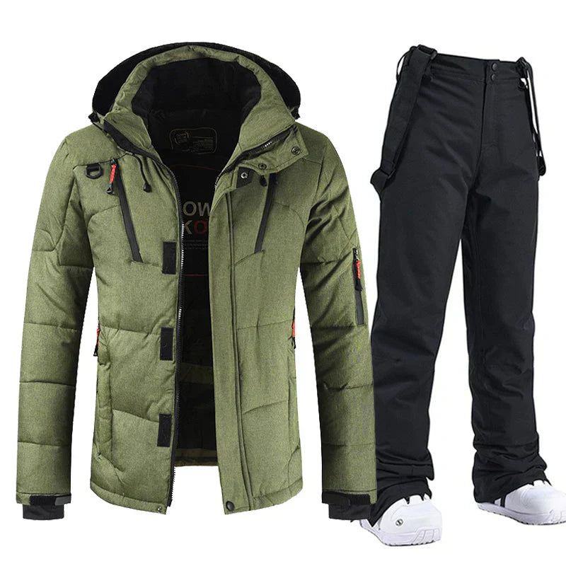 Veste de ski verte avec capuche et pantalon noir, idéale pour sports d'hiver. Ensemble chaud et imperméable, parfait pour snowboard et ski.