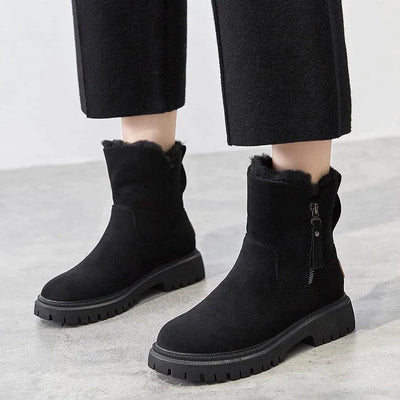 Bottes noires en daim pour femme avec semelle épaisse, fermeture éclair latérale, style hiver, mode élégante, confort et chaleur.