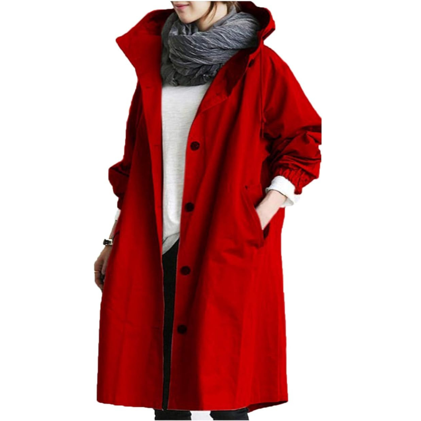 Femme portant un manteau rouge à capuche, écharpe grise et chemise blanche. Mode automne-hiver, style décontracté, tendance vestimentaire.