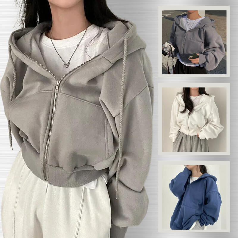 Femme portant un sweat à capuche gris avec fermeture éclair, accompagné de trois vignettes montrant des sweats similaires en blanc, bleu et gris.