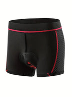 Boxer de cyclisme noir avec rembourrage, détails rouges, tissu respirant. Idéal pour confort et performance en vélo. Vêtements de sport homme.