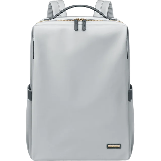 Sac à dos gris élégant et moderne, design minimaliste, fermeture éclair dorée, idéal pour le travail ou les voyages. Accessoire tendance et fonctionnel.