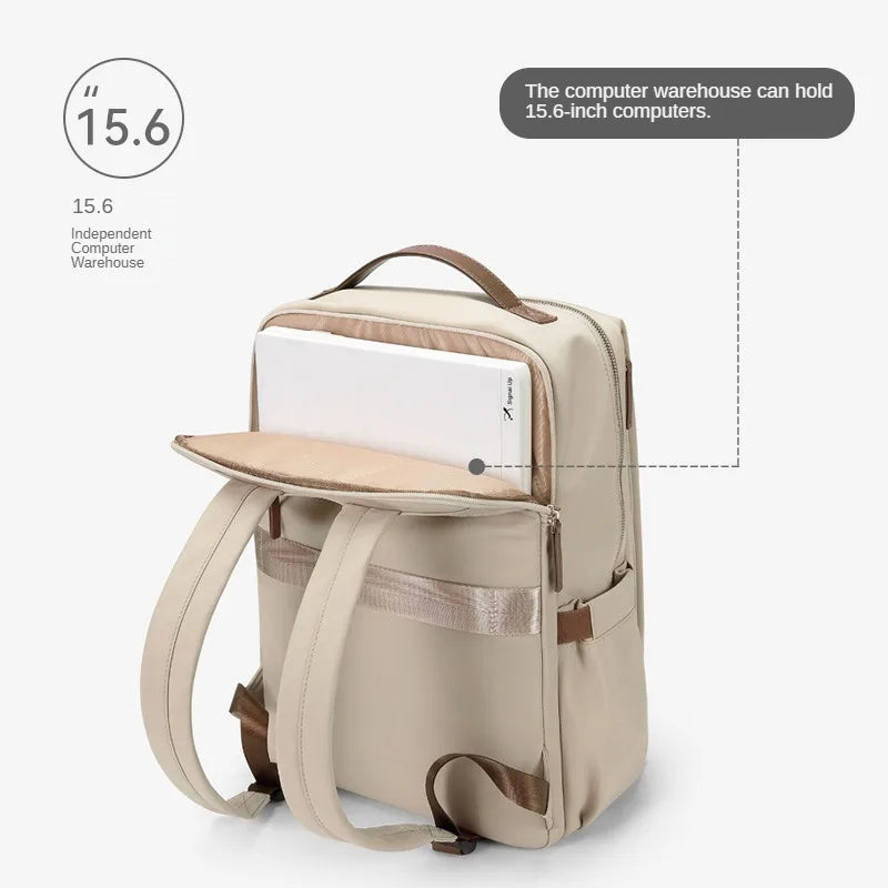 Sac à dos beige avec compartiment pour ordinateur portable 15,6 pouces, design moderne, bretelles ajustables, idéal pour étudiants et professionnels.
