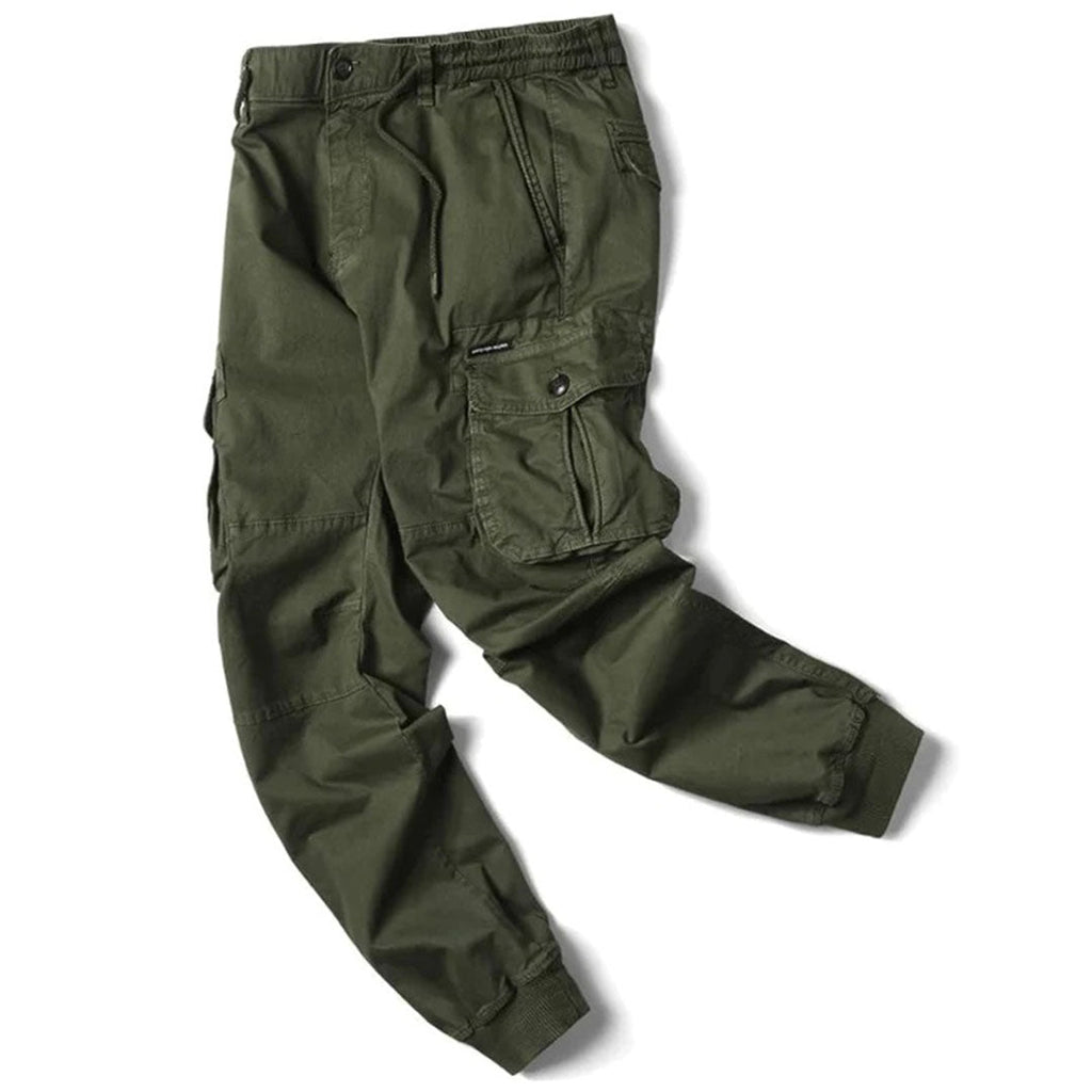 Pantalon cargo vert olive pour homme, style militaire, avec poches multiples et taille élastique. Mode décontractée, tendance et fonctionnelle.