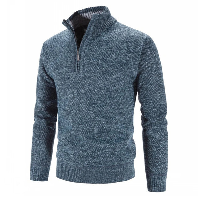 Pull bleu chiné pour homme avec col zippé, manches longues, en laine douce. Mode automne-hiver, style décontracté et élégant.