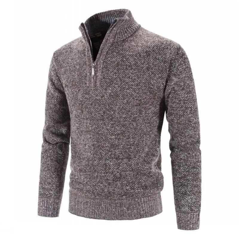 Pull en laine gris chiné avec col zippé, manches longues, texture tricotée. Vêtement chaud et élégant pour homme, idéal pour l'hiver.