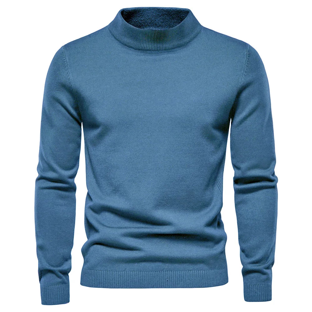 Pull-over bleu col roulé pour homme, en laine douce, manches longues, style élégant et moderne, idéal pour l'hiver et les occasions décontractées.