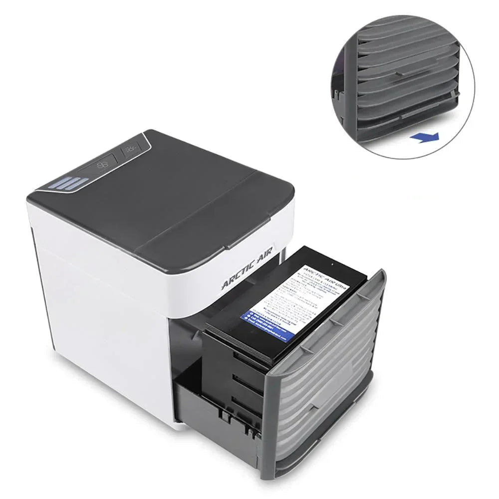 Climatiseur portable Arctic Air, compact et blanc, avec tiroir de filtre amovible. Idéal pour rafraîchir les petits espaces. Économie d'énergie.