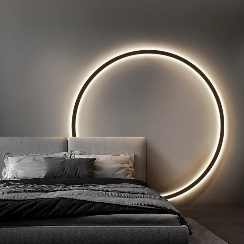Lit moderne avec tête de lit éclairée par un cercle lumineux LED, design minimaliste, chambre contemporaine, ambiance élégante et apaisante.