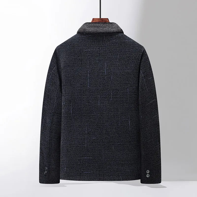 Veste homme élégante en laine gris foncé, coupe classique, col rabattu, boutons aux poignets, idéale pour l'automne et l'hiver.