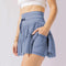 Minifalda de cintura alta para mujer con pliegues y pantalones cortos incorporados