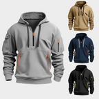 Quatre sweats à capuche tactiques pour hommes, avec poches zippées, en gris, beige, bleu marine et noir, sur fond blanc. Mode décontractée et fonctionnelle.