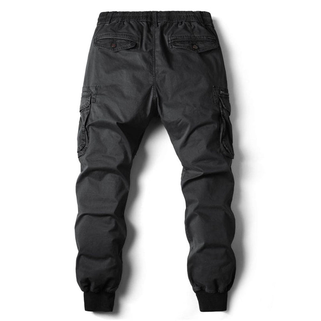 Pantalon cargo noir pour homme, style décontracté, poches latérales, taille élastique, mode urbaine, confortable et pratique.
