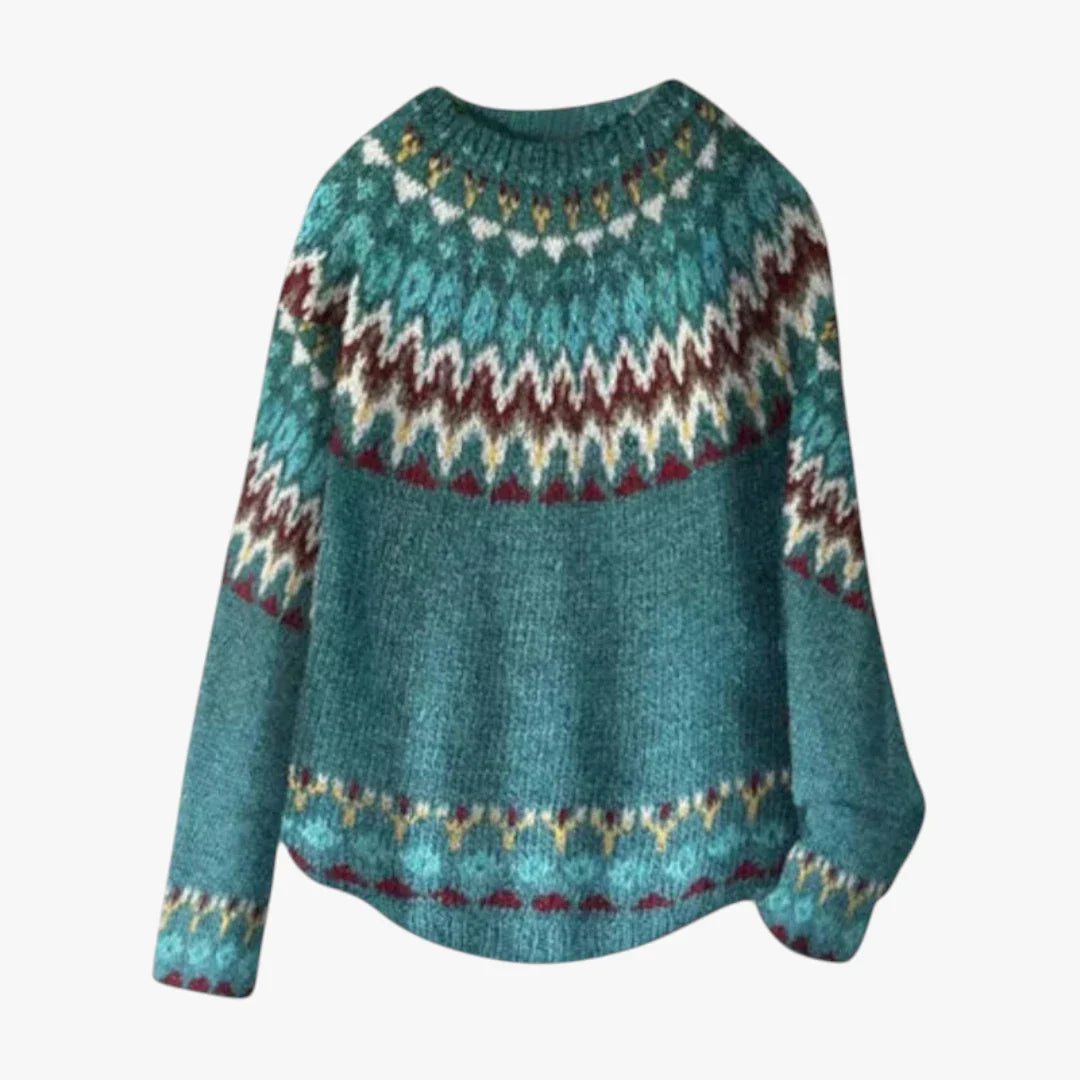 Pull en laine bleu-vert avec motif jacquard nordique, manches longues, col rond. Mode hiver, tricot chaud, style scandinave.