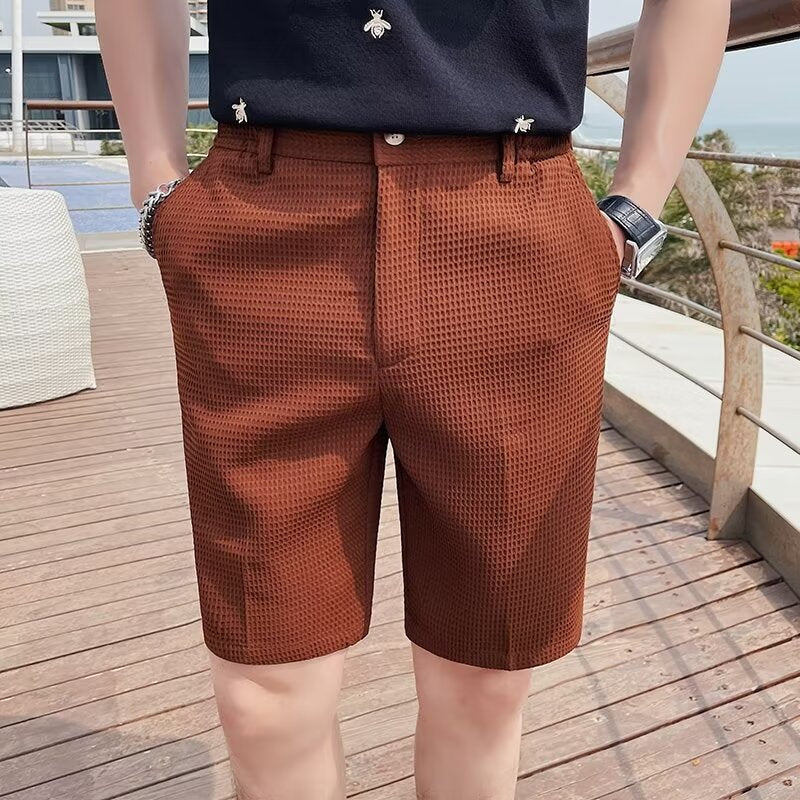 Pantalones cortos a medida para hombre - corte entallado - largo hasta la rodilla - cintura abotonada - trabillas para cinturón