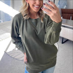 Ribbed knit sweater with side pockets for women