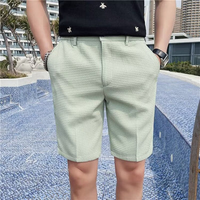 Pantalones cortos a medida para hombre - corte entallado - largo hasta la rodilla - cintura abotonada - trabillas para cinturón