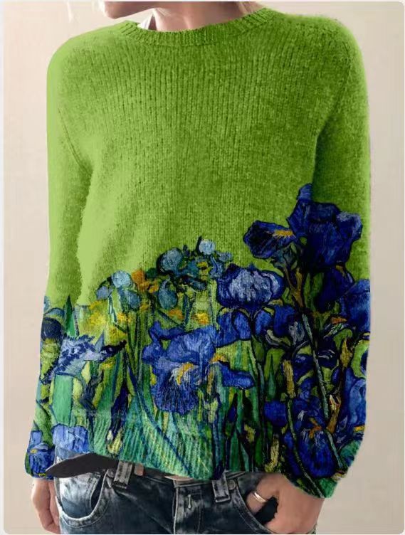 Pull vert en laine avec motif floral bleu et jaune, style décontracté. Idéal pour l'automne, mode féminine, tendance et confortable.