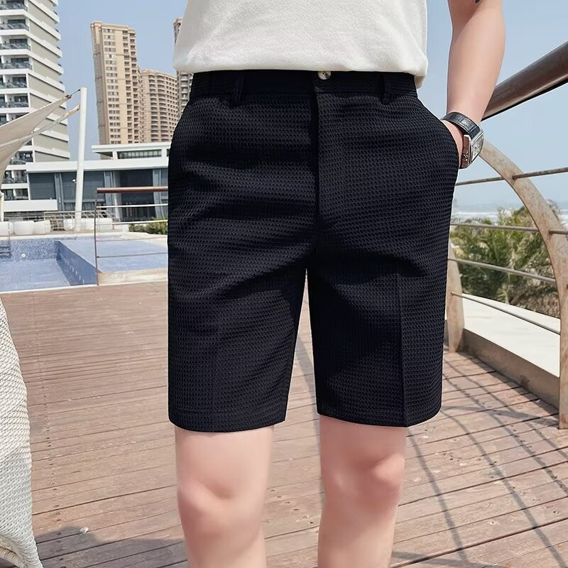 Pantalones cortos a medida para hombre - corte entallado - largo hasta la rodilla - cintura abotonada - trabillas para cinturón