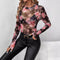 Top in rete con motivo floreale - Collo alto e vestibilità slim