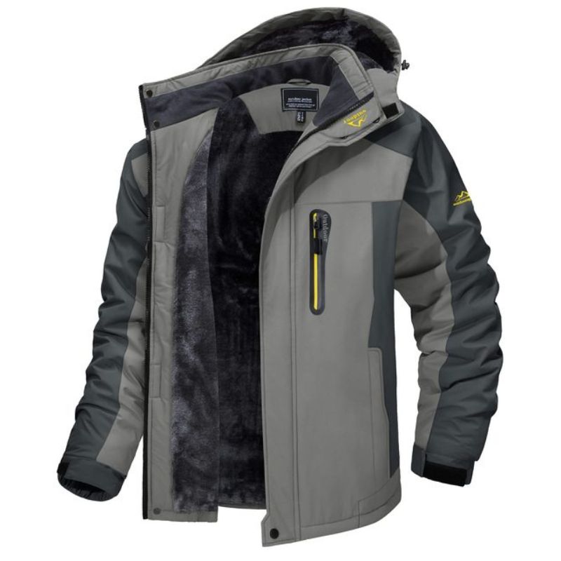 Veste d'hiver imperméable grise pour homme avec doublure en fourrure, capuche amovible et poches zippées, idéale pour le froid et les activités extérieures.