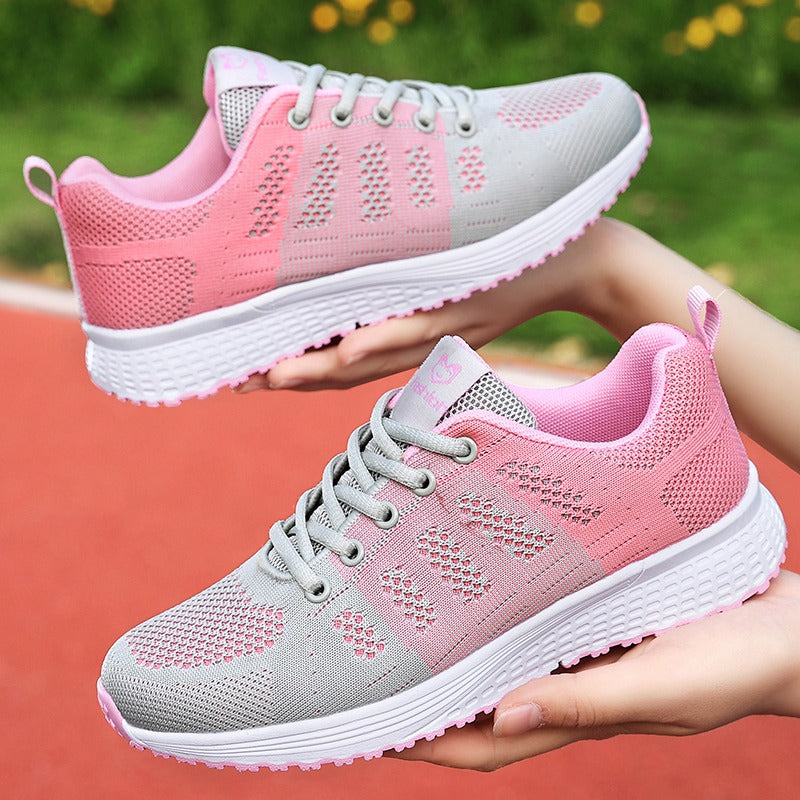 Chaussures de sport légères pour femmes, rose et gris, semelle antidérapante, idéales pour la course et le fitness, confort et style moderne.