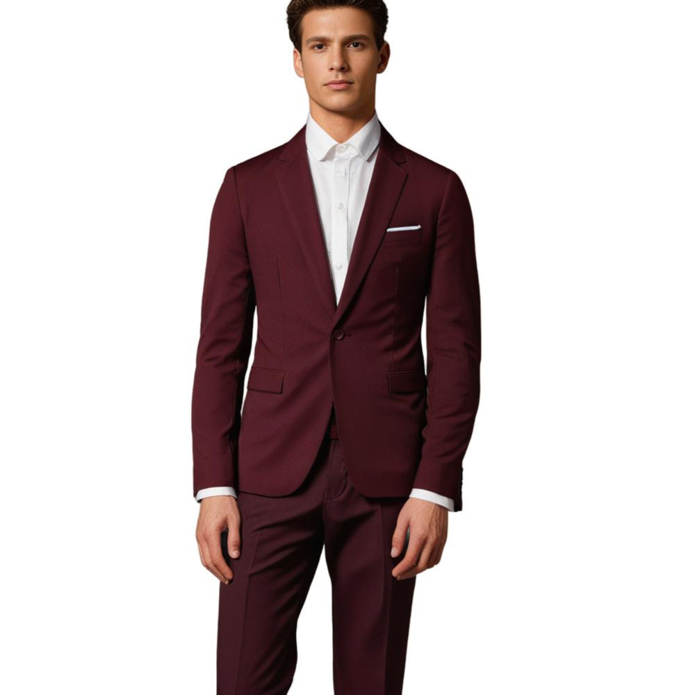 Homme en costume bordeaux élégant, chemise blanche, pose debout. Mode masculine, tenue formelle, style moderne, costume sur mesure.