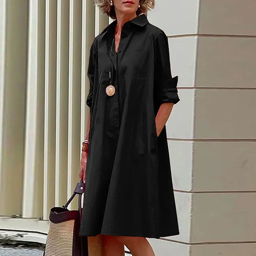 Vestido camisero de corte A para mujer, abotonado, manga larga, cuello clásico y largo hasta la rodilla.