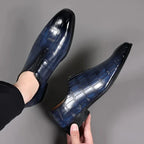 Chaussures habillées en cuir bleu à motif crocodile pour homme, élégantes et modernes, idéales pour un look formel ou professionnel.