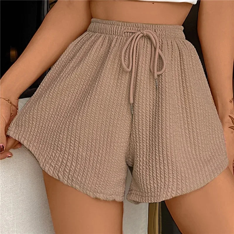 Noor - Shorts anchos con cordón