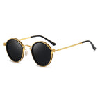 Lunettes de soleil rondes vintage avec monture dorée et verres noirs, style rétro chic, accessoire de mode tendance pour homme et femme.